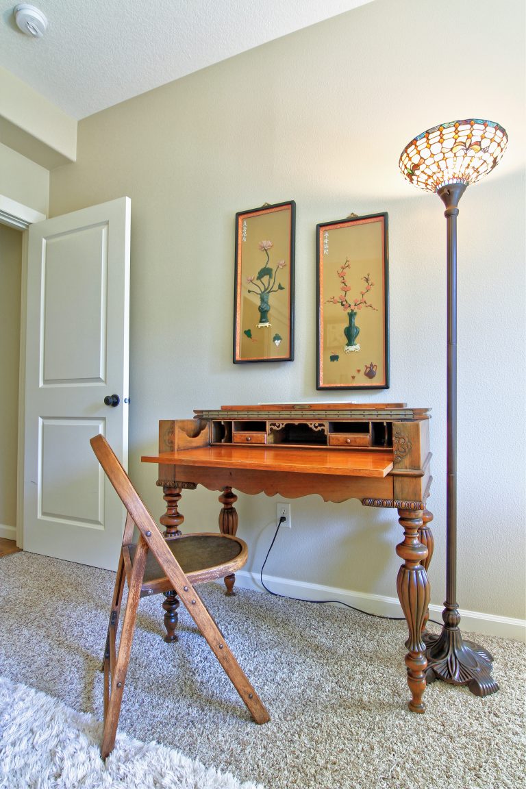 Antique, wood spinet desk from the 1920s.